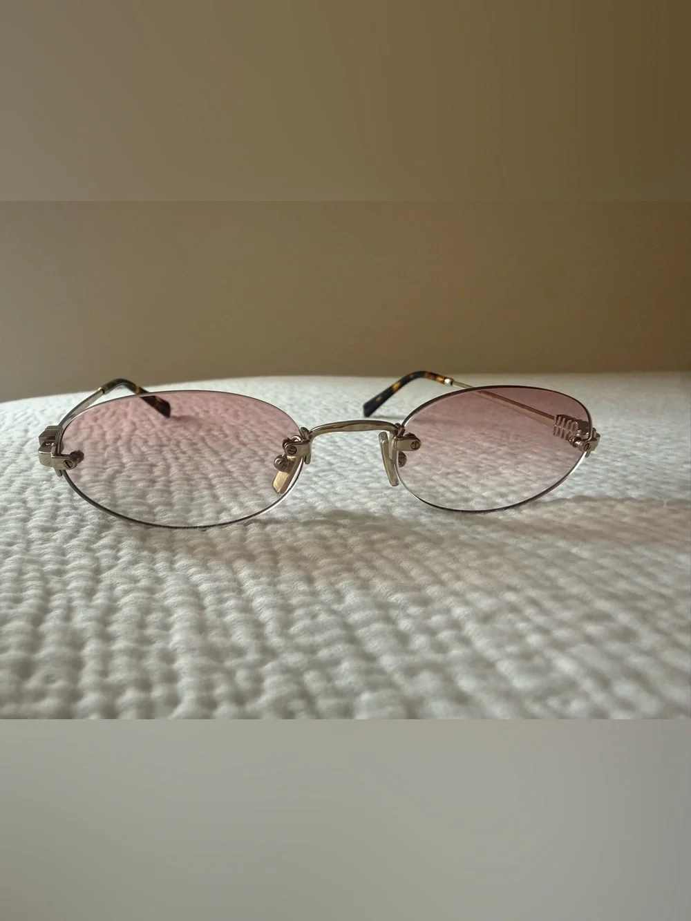 Miu Miu Oval Sunglasses